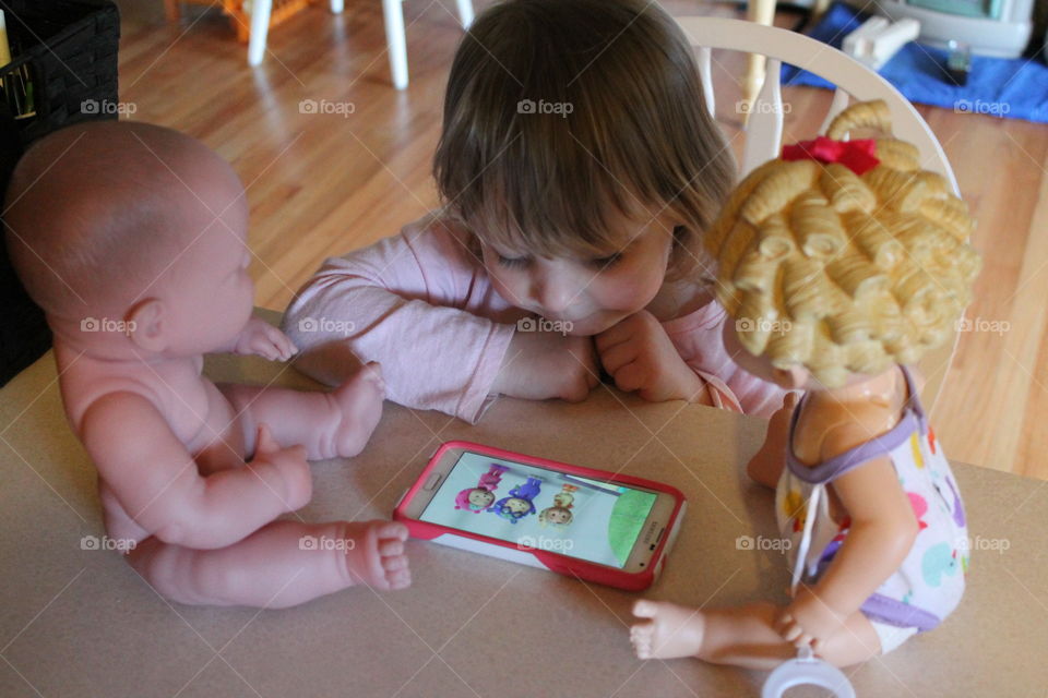 watching apps with dolls