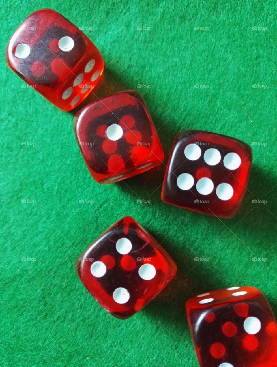 red Dices on Green table