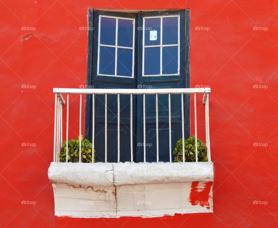 Beautiful Rustic Retro Balcony in a Passionate Red Background