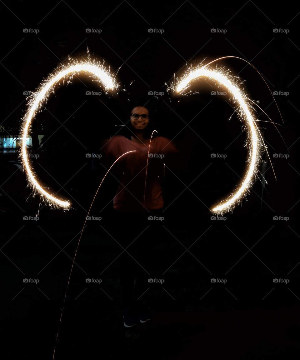 Young lady with firework
Butterfly effect look