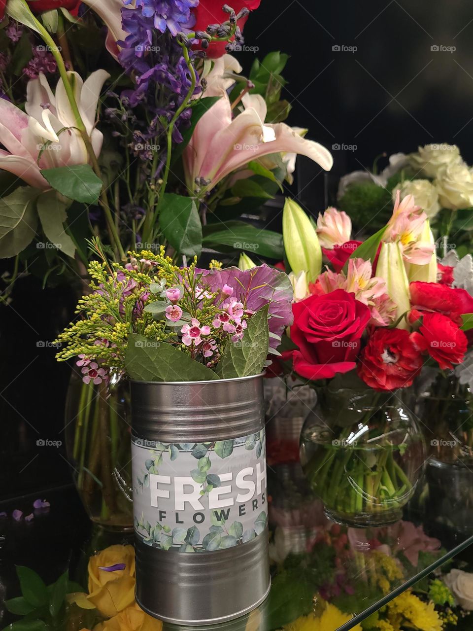 spring flowers in a glass vase, blooms honoring the end of winter