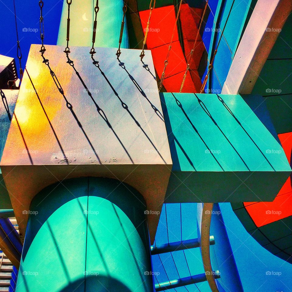 Looking up at a colorful building in bright sunlight