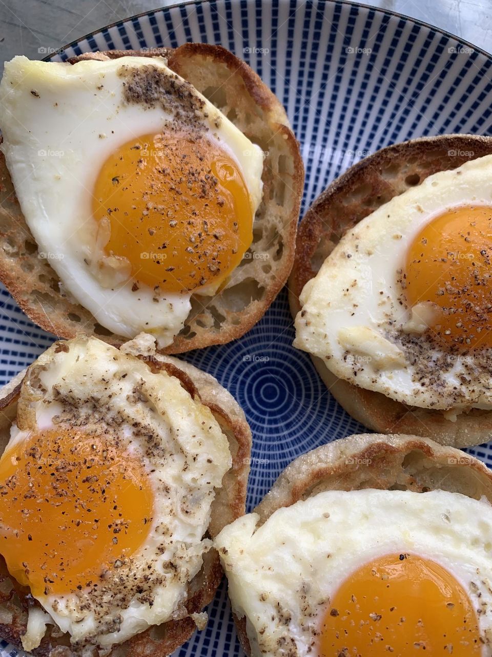 Fried eggs on muffins
