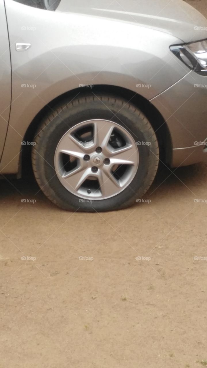 Deflated car tyre