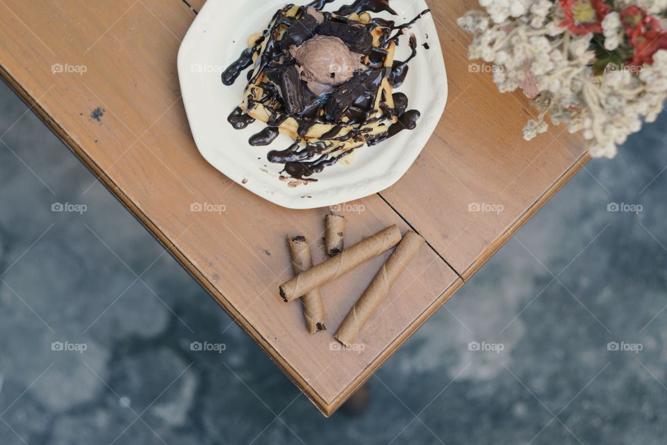 Pancake with chocolate ice cream in plate