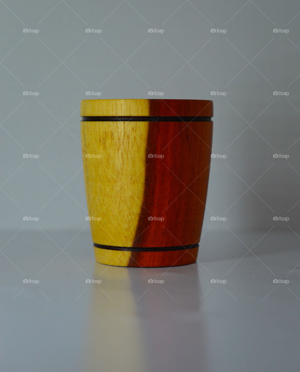 wooden cup made by the Pataxó indigenous people of the red crown village in the extreme south of Bahia.  This cup is used to drink cachaça and also as a topping or decoration