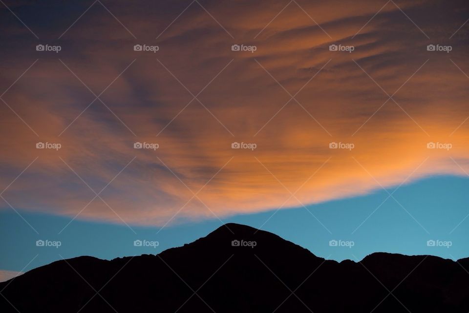 Mountain silhouette at sunset