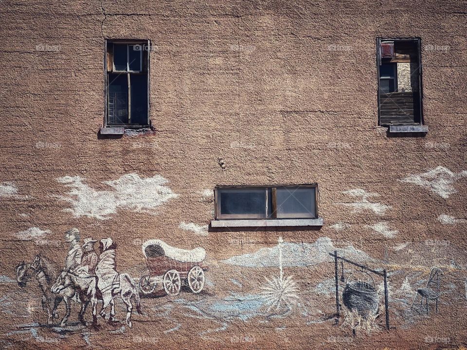 Fort Sumner, New Mexico street art depicting life in the southwest in the 19th century. 