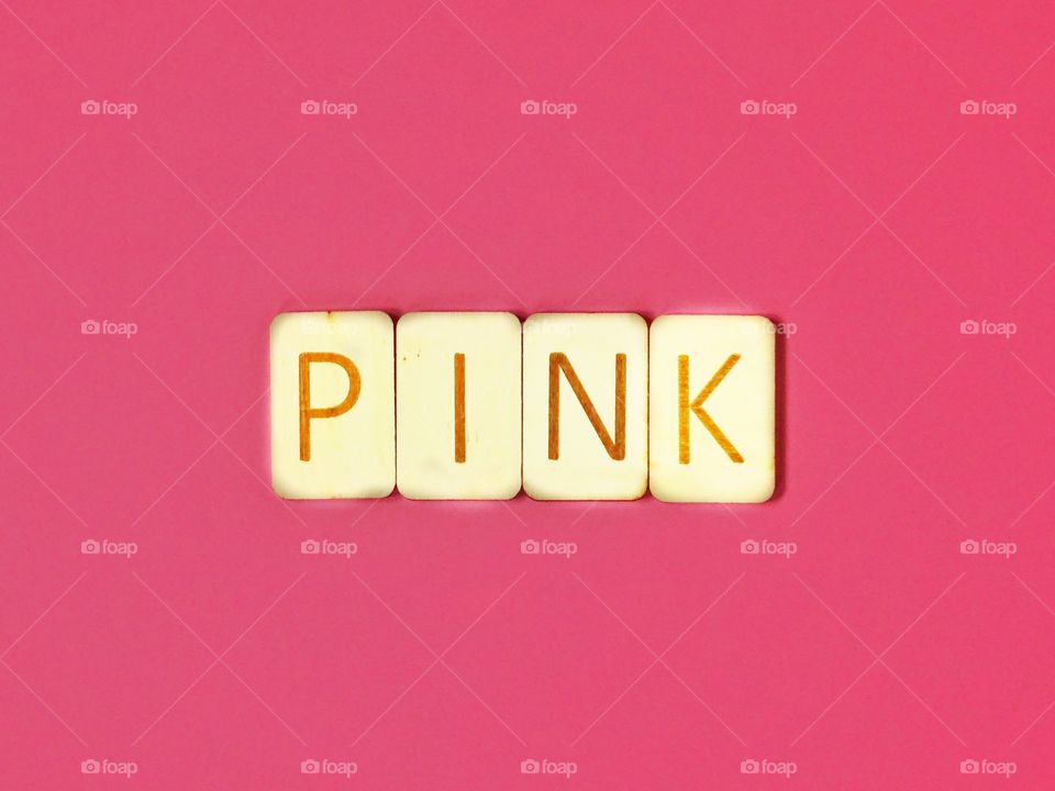 Pink with wooden letters