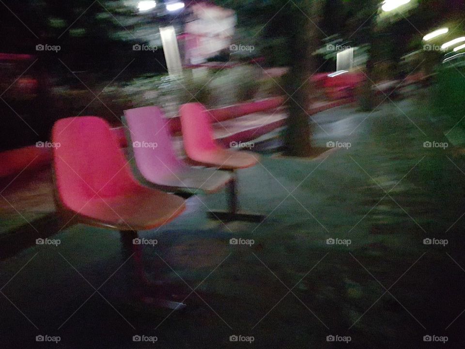 Chairs under street lamp