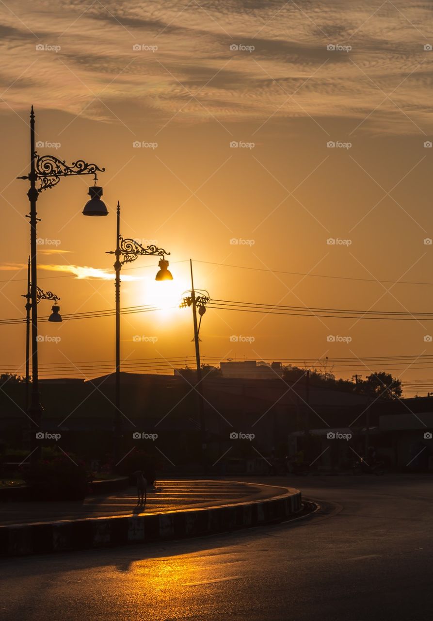 Street lamp with sunrise