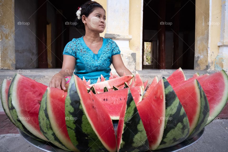 Woman sell melon at Myanmar pagoda 