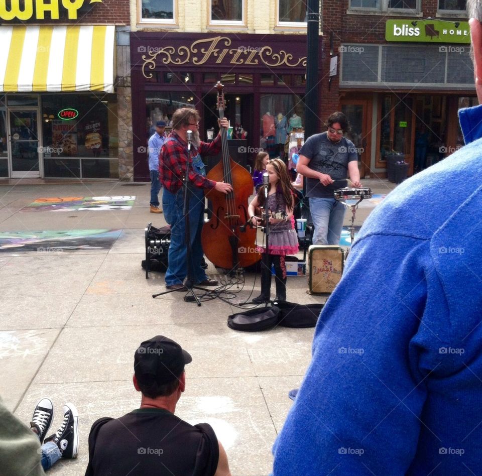 Street music . A little girl rocking out in Tennessee last spring