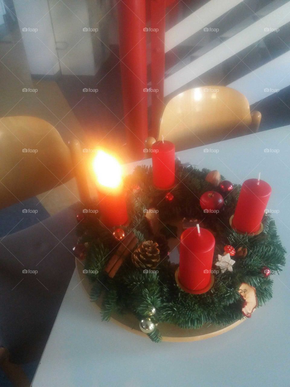 Advent Wreath with one burning candle
