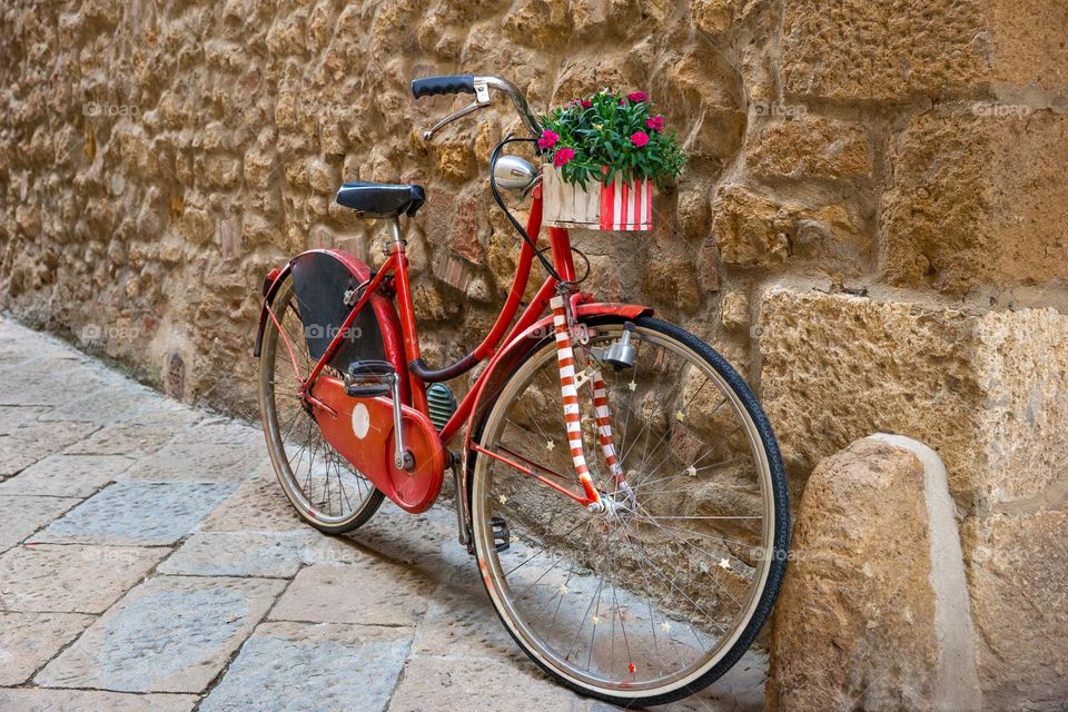 red bicycle with flowers