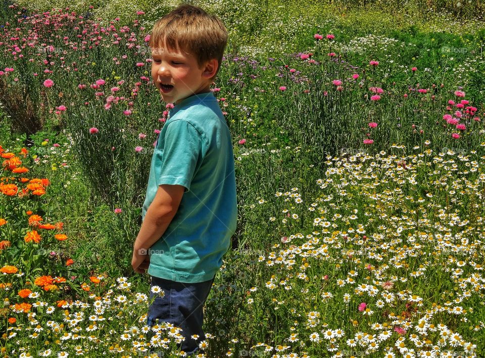 Boy In California Coastal Garden