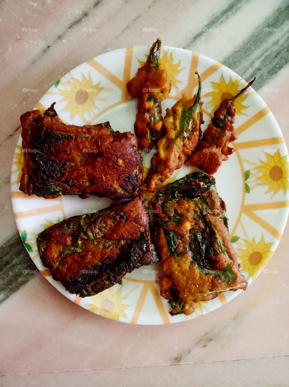 Arabi Pakode: It's an indian dish know as arabi pakode. Crispy deep fried the leaf of arabi in the batter of besan, spices and herbs.