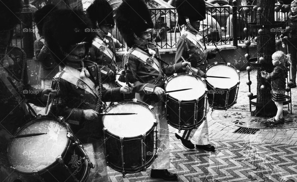 drummer  boys and a tiny spectator
