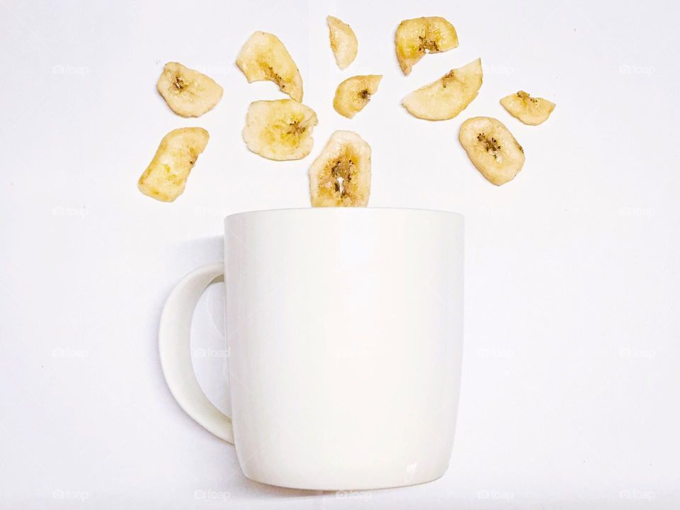 Mug and dried bananas