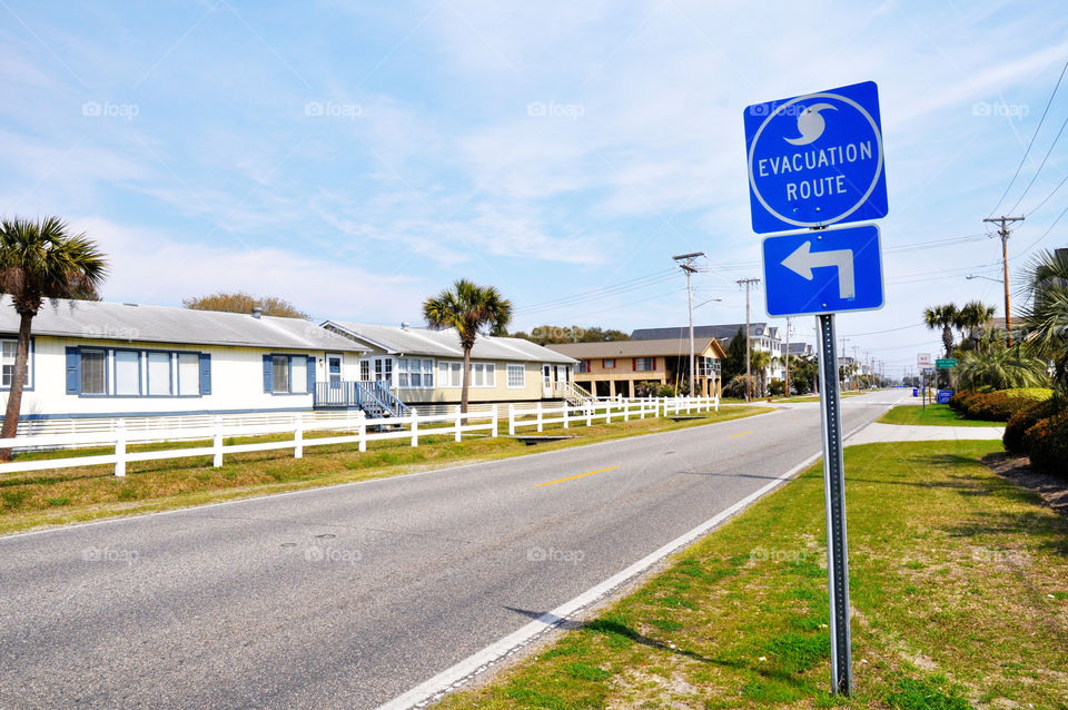 Hurricane a vacuolation route sign and road. 