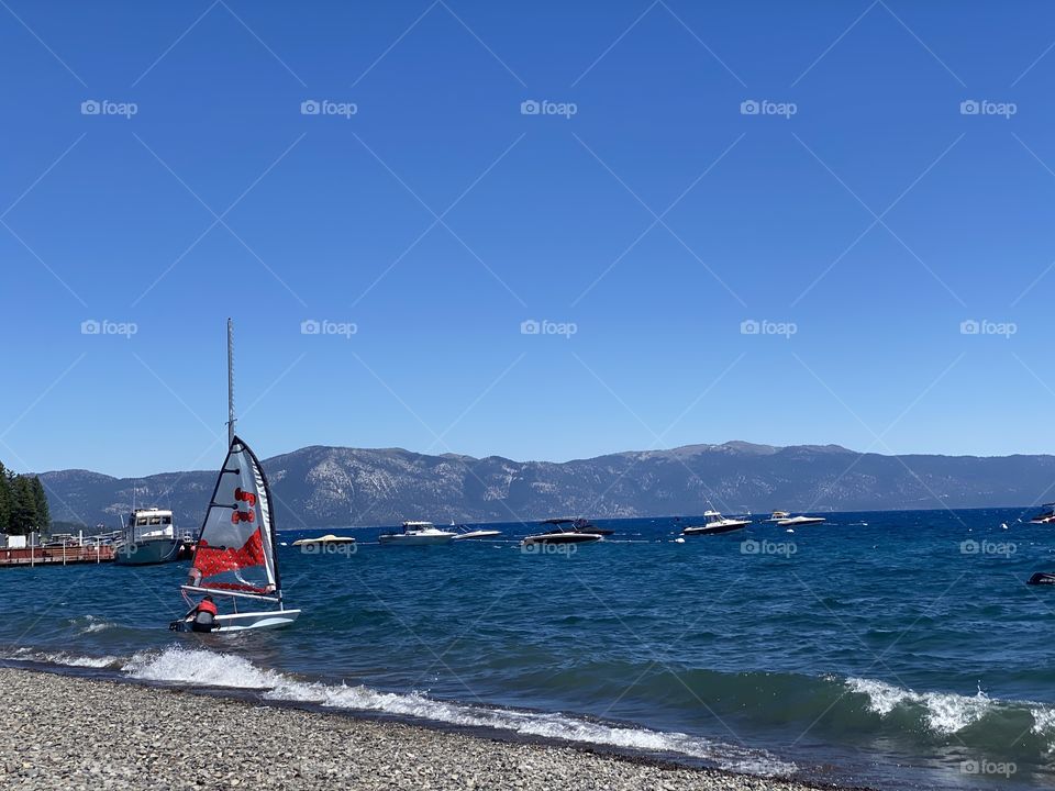 If it is windy enough and you have nowhere to be, why not take a small sailboat out?!