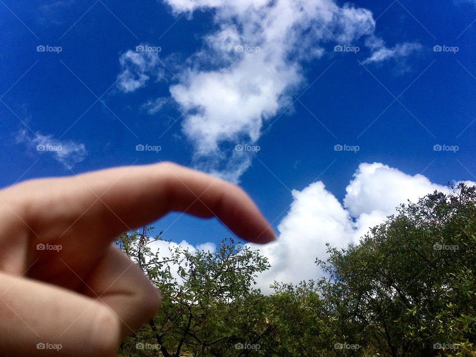 Scratching the clouds with my finger