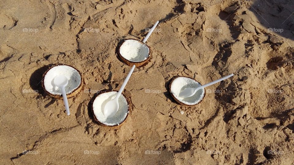 Coconut ice cream bowls on the beach