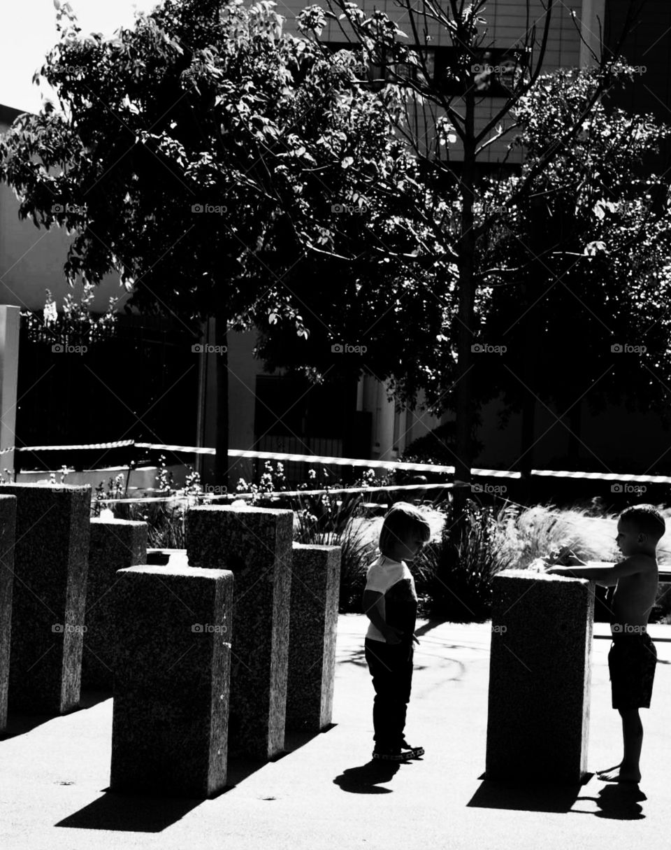 Children drinking from fountain 