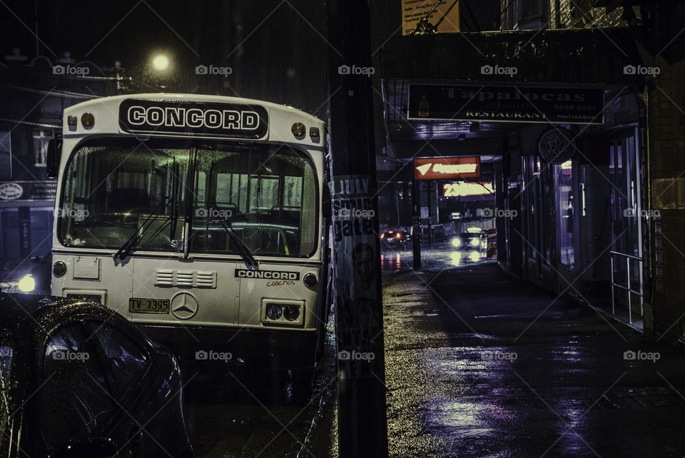 Bus at night in the rain