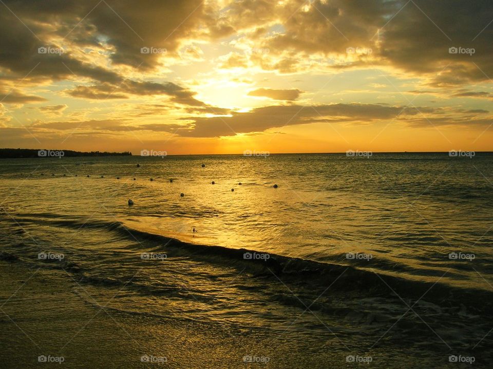 Scenic view of beach during sunset