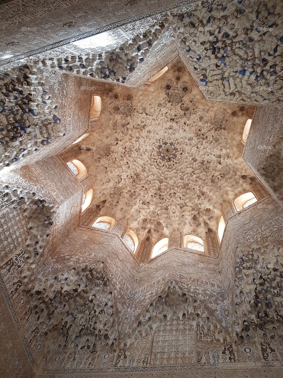 Splendid  star-shaped vault from the Nasrid Palace in Alhambra. Granada. Spain.