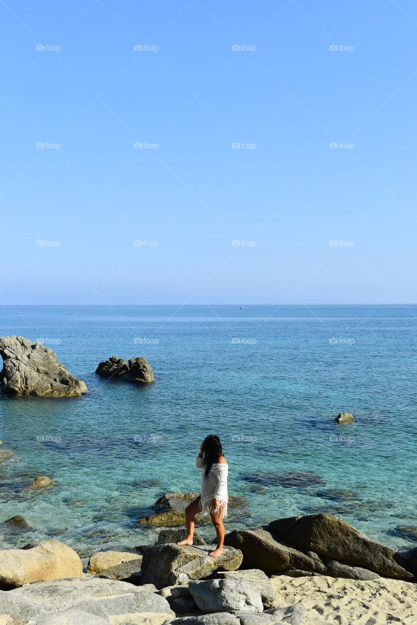 Girl looking at the sea