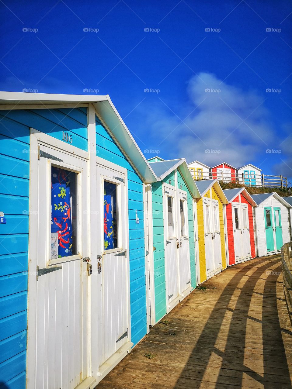 Colourful beach huts in Cornwall