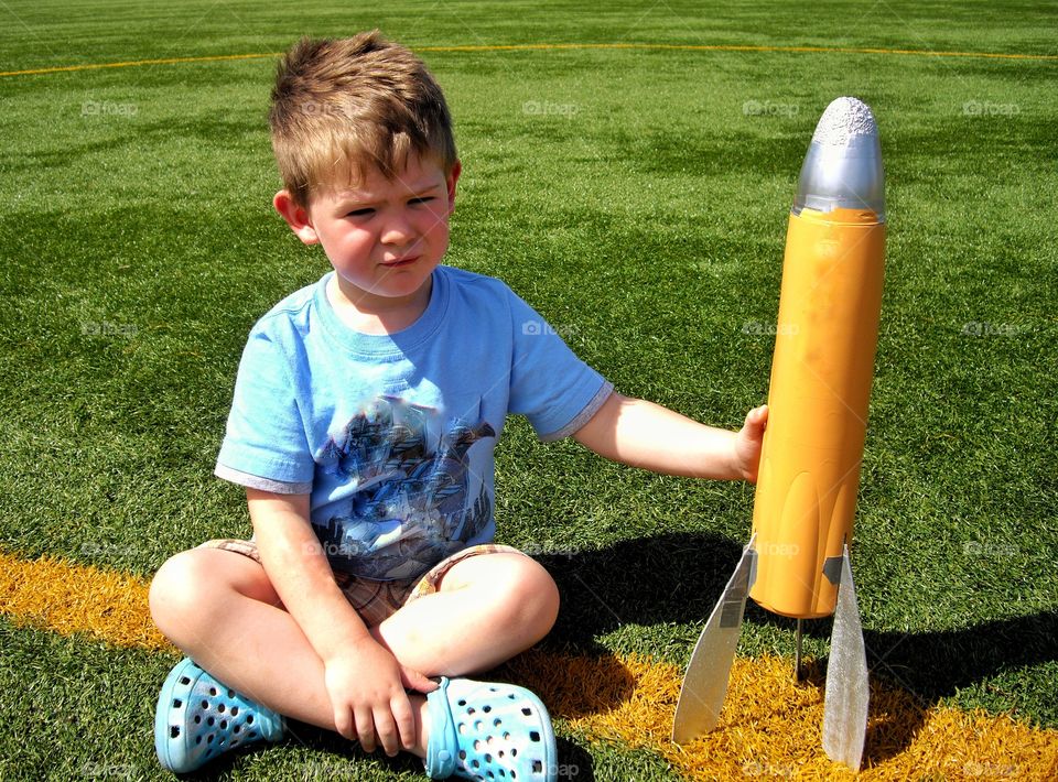 Boy With Model Rocket