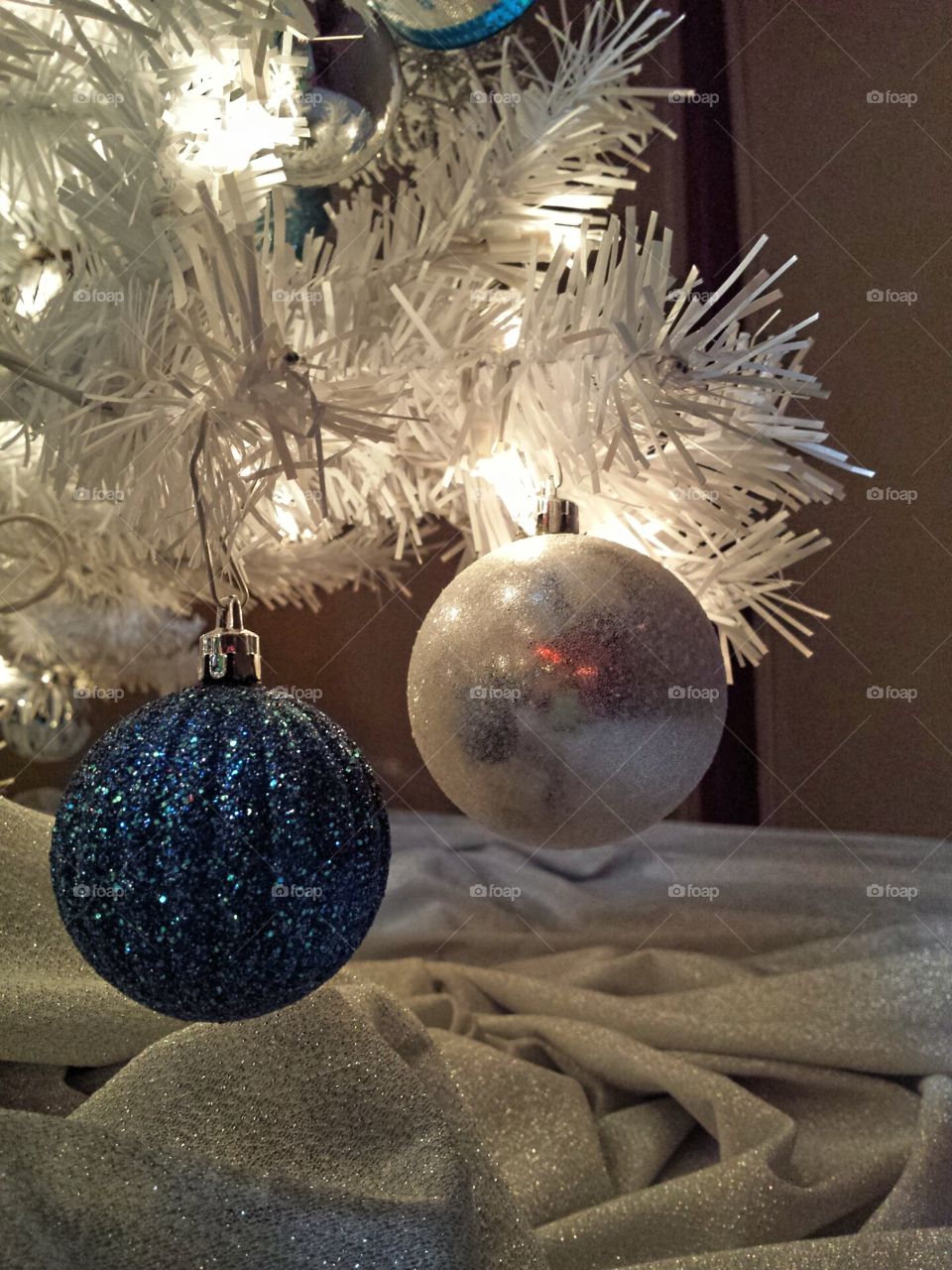 White Christmas tree with blue and silver decoration