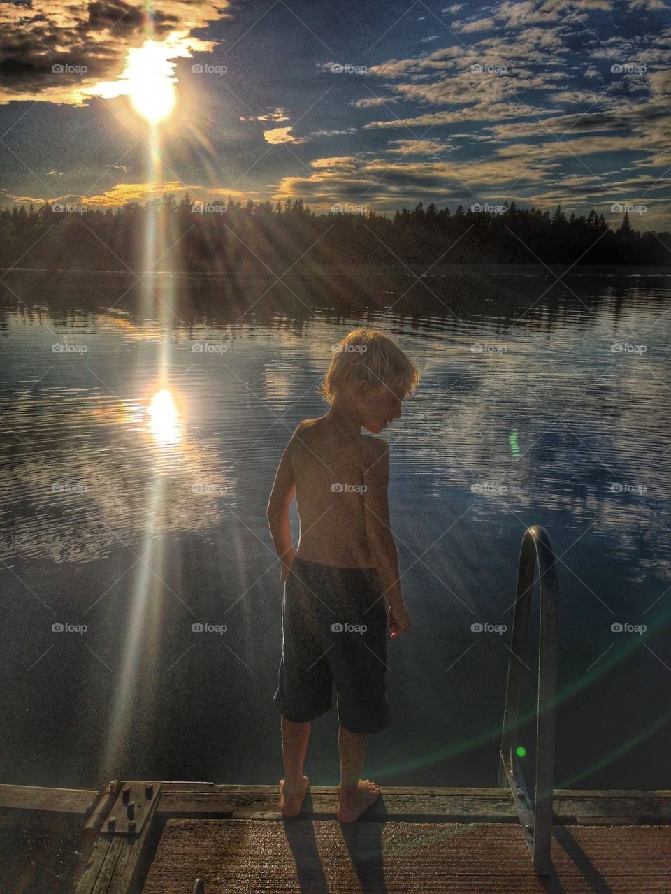 Boy in sunset 