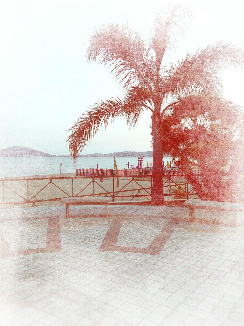 Beach in red fog. Formia, Italy.
