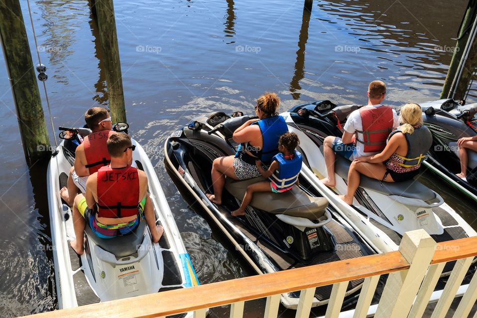 Tourist in the jet ski listening to the instruction