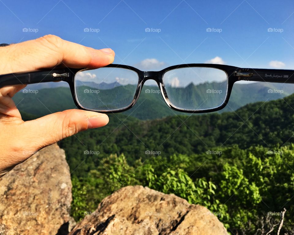 Unique Mountain view of beautiful landscapes through glasses