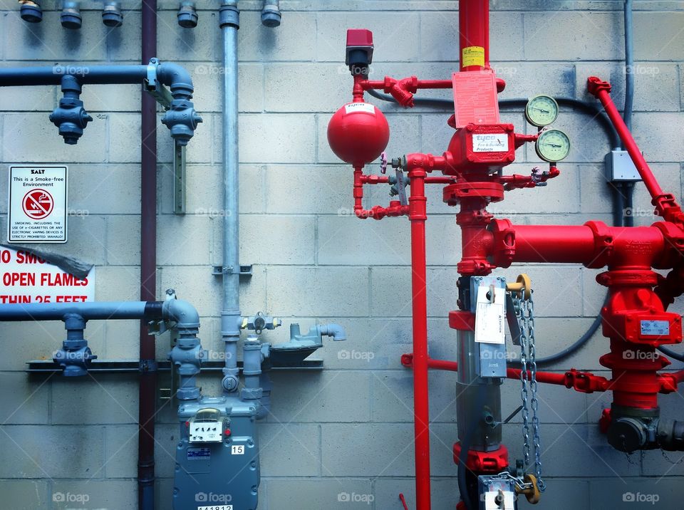 Gas meters along outside wall of building