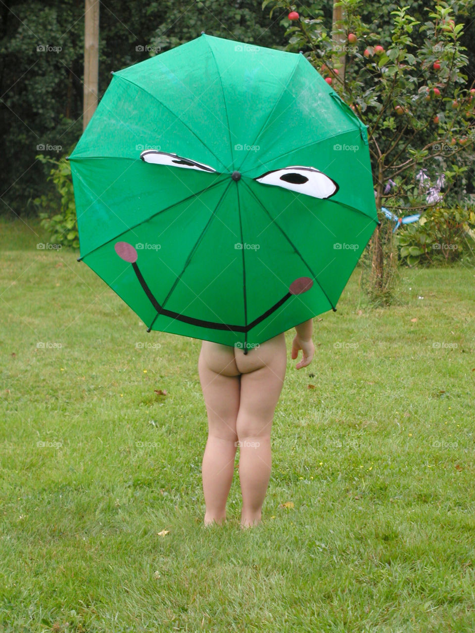 denmark. umbrella. rain. face. butt. boy. garden by snutten