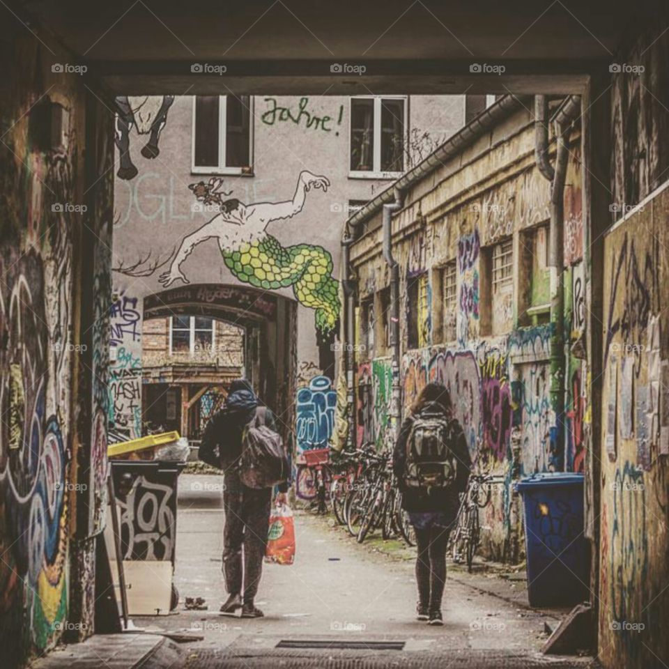 two freinds walking alone in the street good