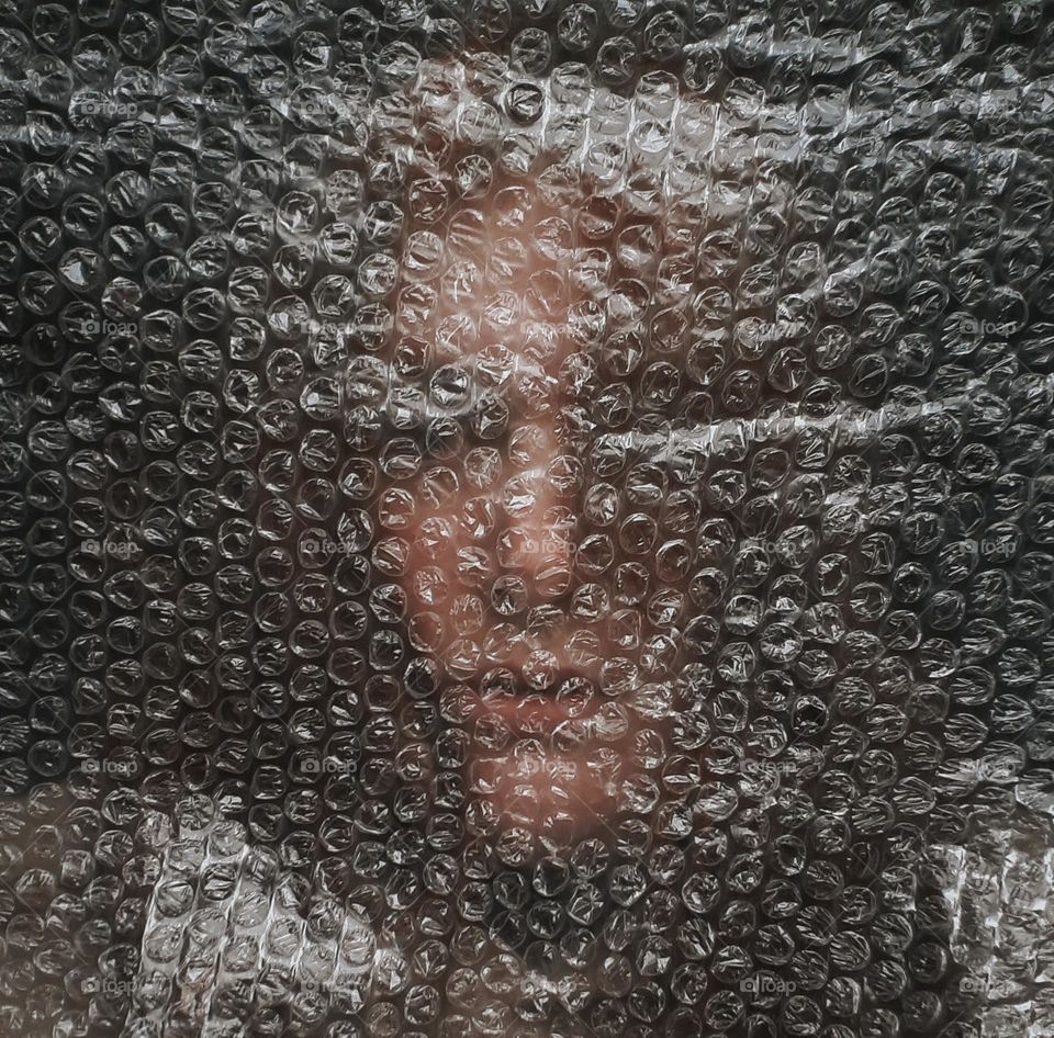 Portrait of a girl with a protective film