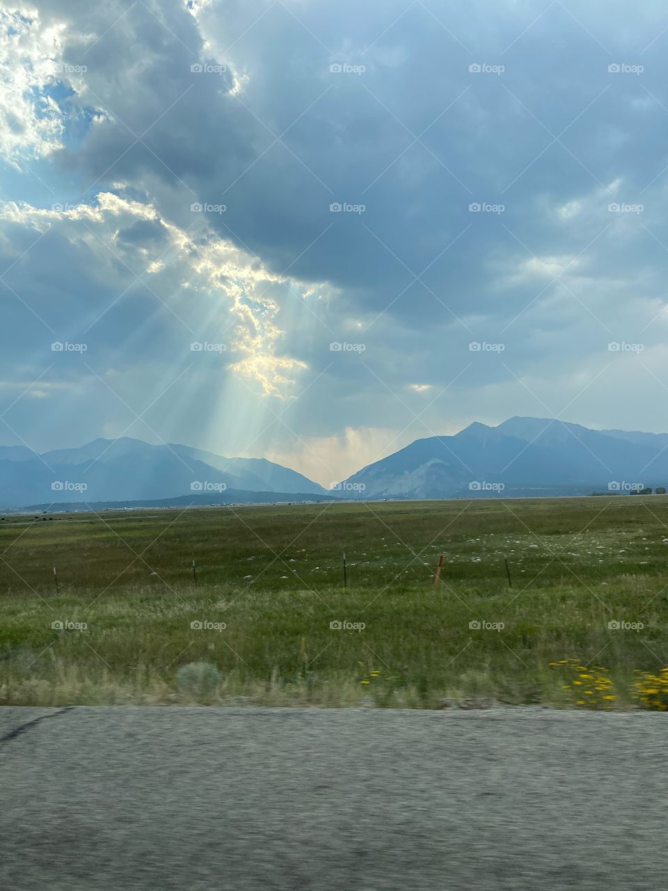 Sun streaming through the clouds 