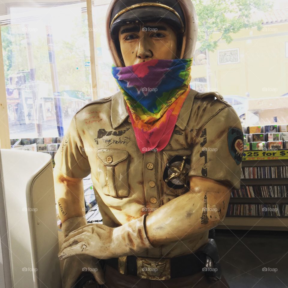 Police statue with a rainbow bandana in Berkeley 