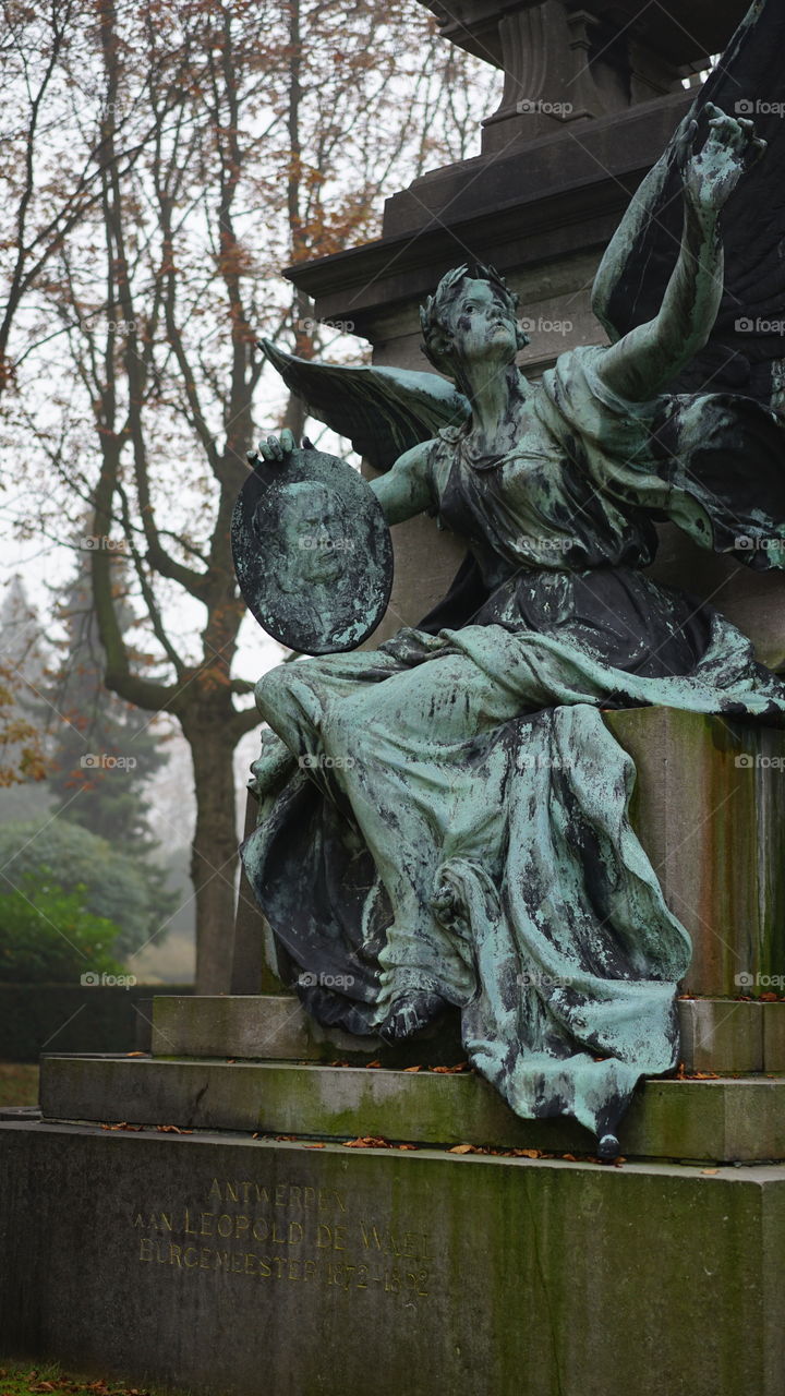 Old art on a cemetery in Antwerp
