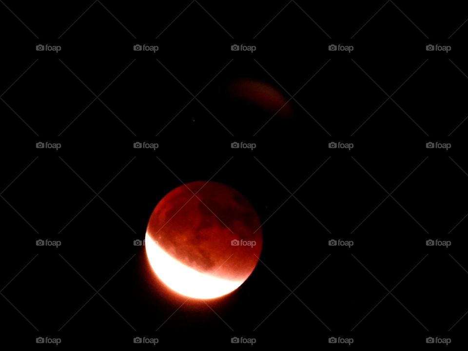 My photos of the Blood Moon, Total lunar eclipse on 15 May 2022 - Lunar eclipses occur when Earth aligns between the sun and the moon and casts a shadow across the lunar surface. The weather condition were very cloudy