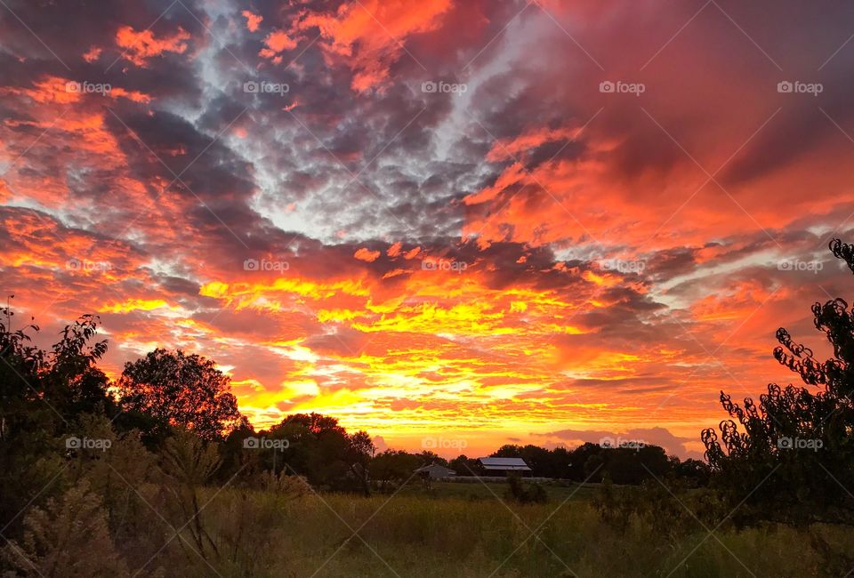 Beautiful red orange yellow sunset on a stormy day