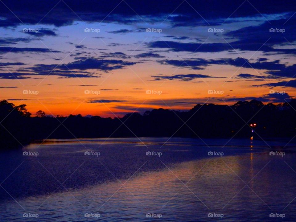 Dramatic sky reflecting on lake