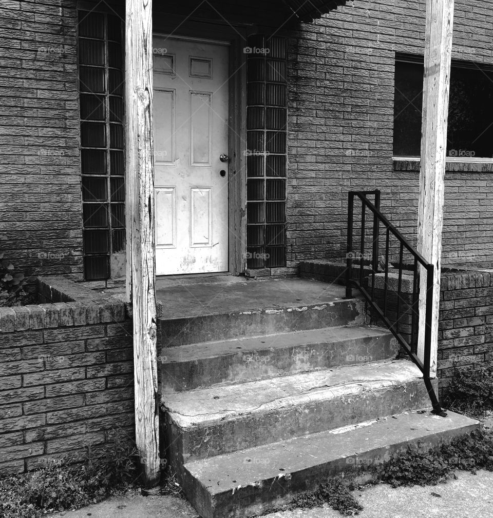 These dirty, nasty, and broken up steps belong to an apartment complex in a gutter along Pennsylvania Avenue okc Oklahoma. My mom lived there for years and me and my hard headed, knuckle dragging friends use to spend our days drinking, smoking.